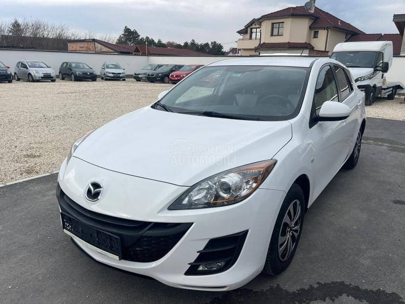 Mazda 3 1,6 d perla