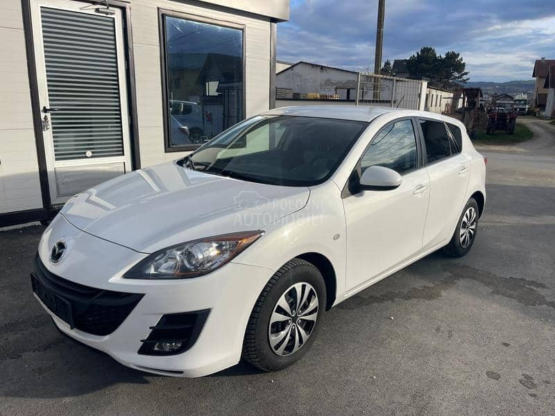 Mazda 3 1,6 d perla