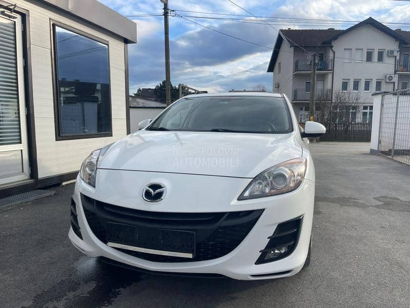 Mazda 3 1,6 d perla