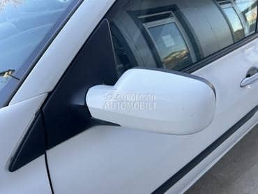 Retrovizor levi beli DV369 za Renault Megane od 2003. do 2009. god.