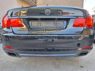 Branik zadnji crni F01 za BMW 750, 730, 740 ... od 2008. do 2015. god.