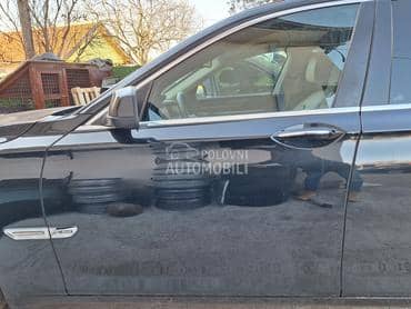 Vrata prednja leva crna F01 za BMW 750, 730, 740 ... od 2008. do 2015. god.
