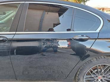 Vrata zadnja leva crna F01 za BMW 750, 730, 740 ... od 2008. do 2015. god.