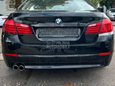 Branik zadnji crni F10 za BMW 518, 520, 523 ... od 2010. do 2017. god.