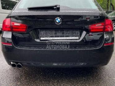 Branik zadnji crni F11 za BMW 518, 520, 523 ... od 2010. do 2017. god.