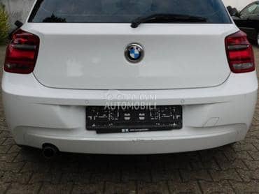 Branik zadnji beli F20/21 za BMW 125, 116, 118 ... od 2011. do 2015. god.