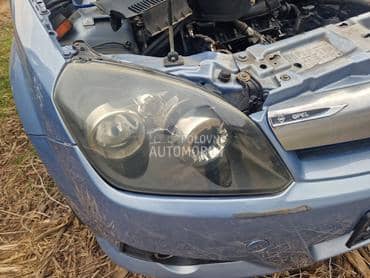 Desni far crni za Opel Tigra