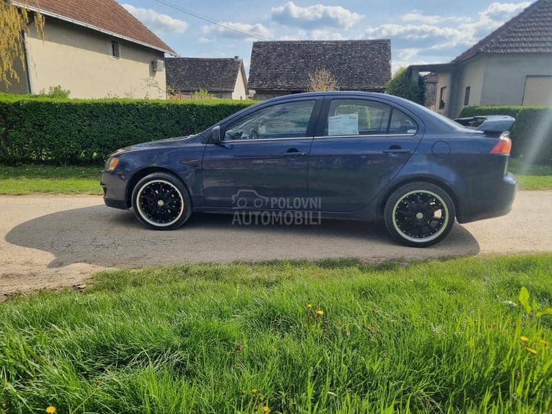 Mitsubishi Lancer reg god dana