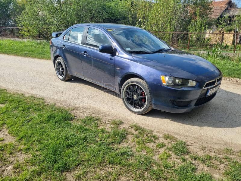 Mitsubishi Lancer reg god dana