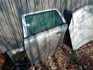 zadnja leva vrata siva karavan za Opel Astra H