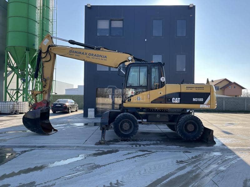 CAT M318