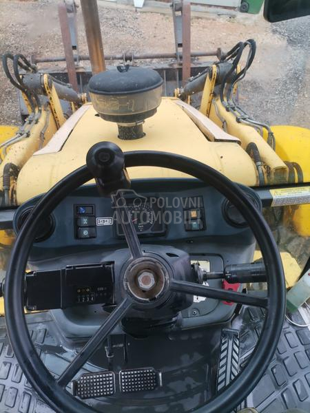 New Holland LB115