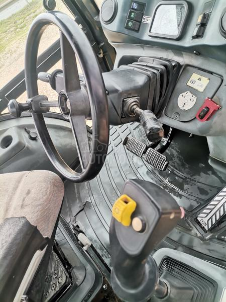 New Holland LB115