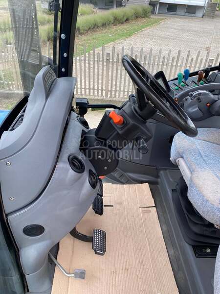 New Holland TS135A Svajcara
