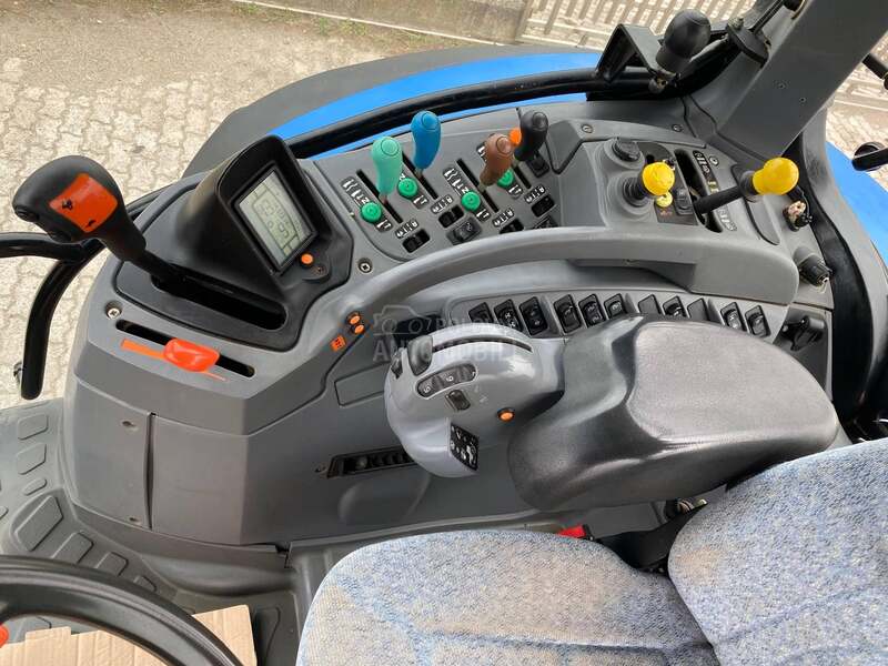 New Holland TS135A Svajcara