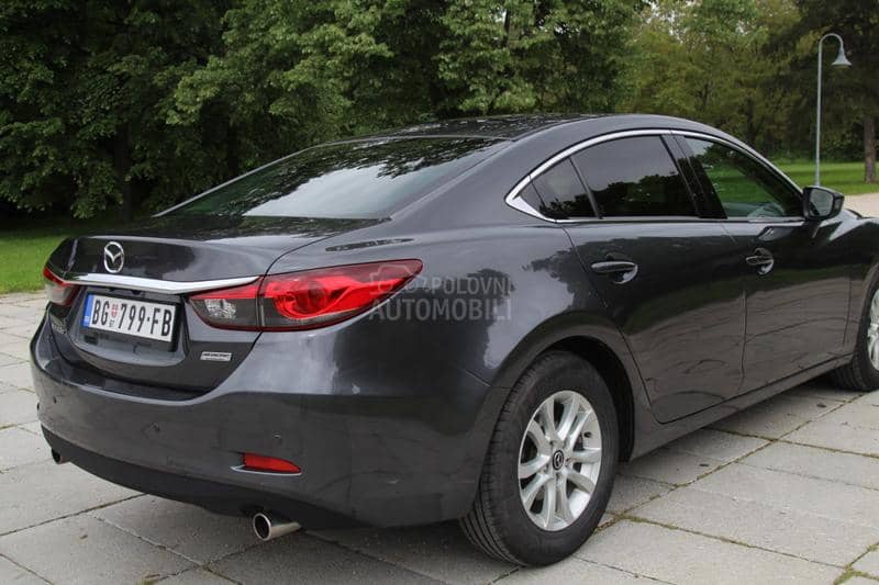Mazda 6 2.2 AT REVOLUTION