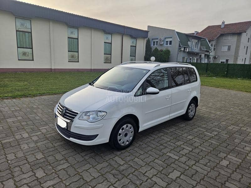Volkswagen Touran 1.9TDi DSG Odl ičan