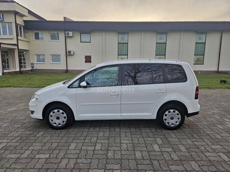 Volkswagen Touran 1.9TDi DSG Odl ičan