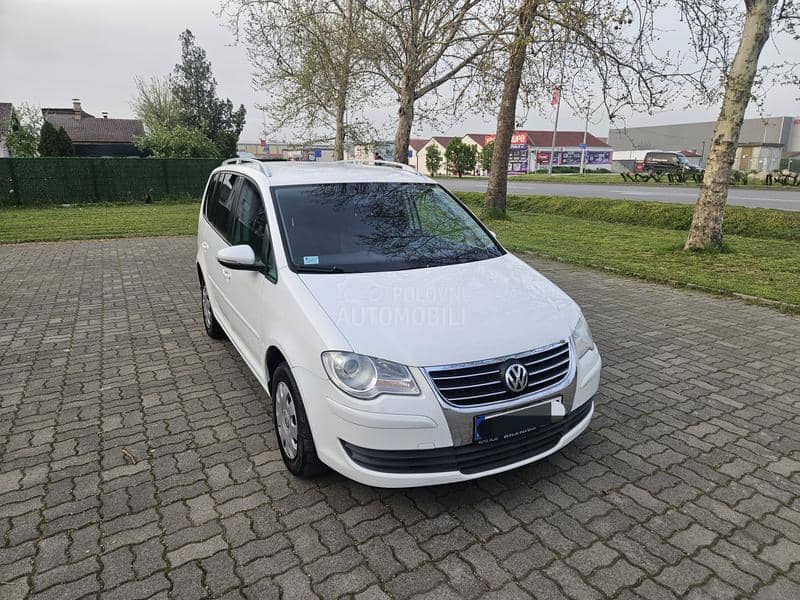 Volkswagen Touran 1.9TDi DSG Odl ičan