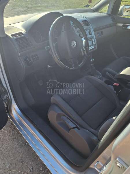 Volkswagen Touran 7 sedista 1.9