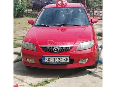 Mazda 323 2002. god. -  kompletan auto u delovima