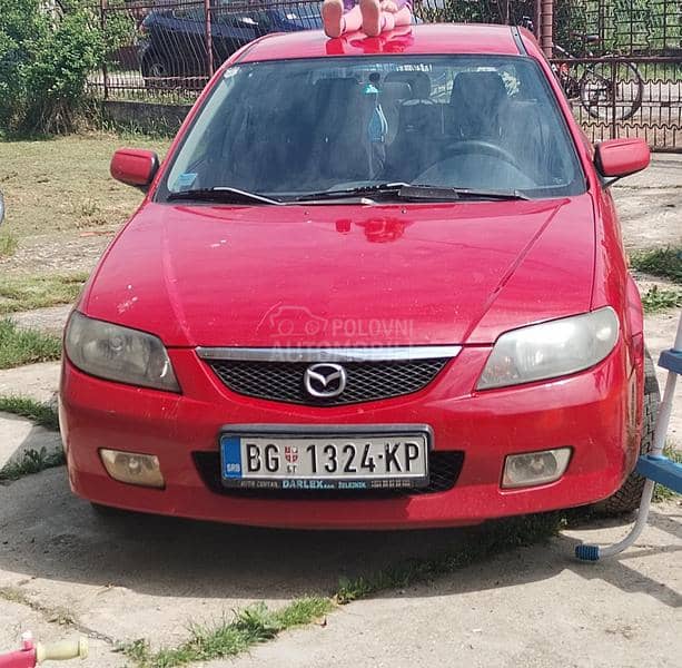 Mazda 323 2002. god. -  kompletan auto u delovima