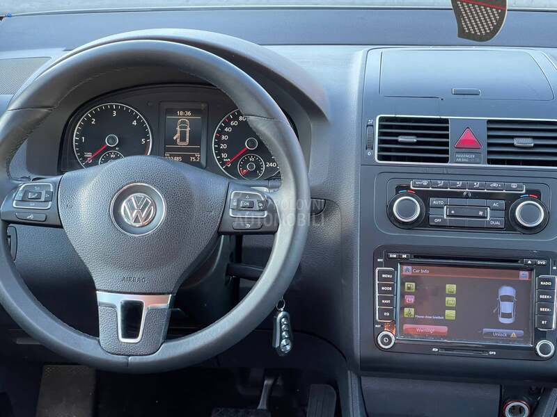 Volkswagen Touran 2.0 DSG / Regist
