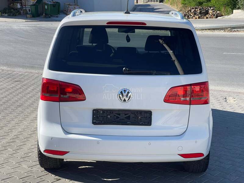 Volkswagen Touran 2.0 DSG / Regist