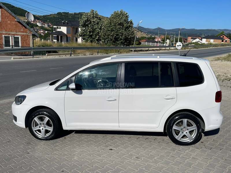 Volkswagen Touran 2.0 DSG / Regist