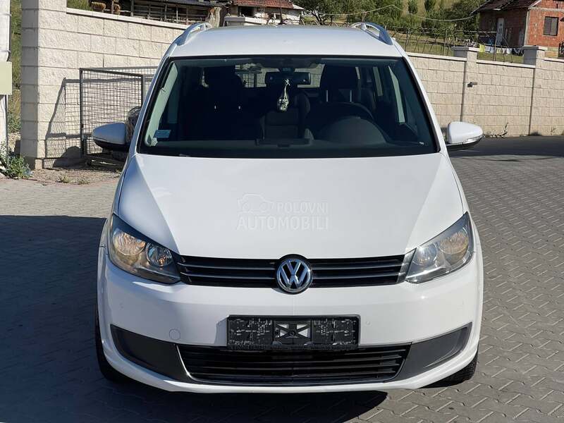 Volkswagen Touran 2.0 DSG / Regist