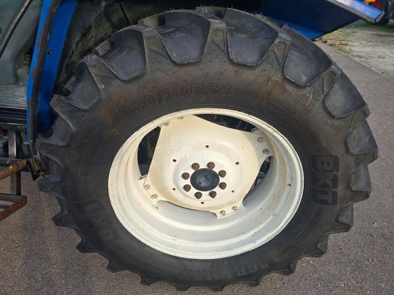 New Holland TL100A   E x t r a