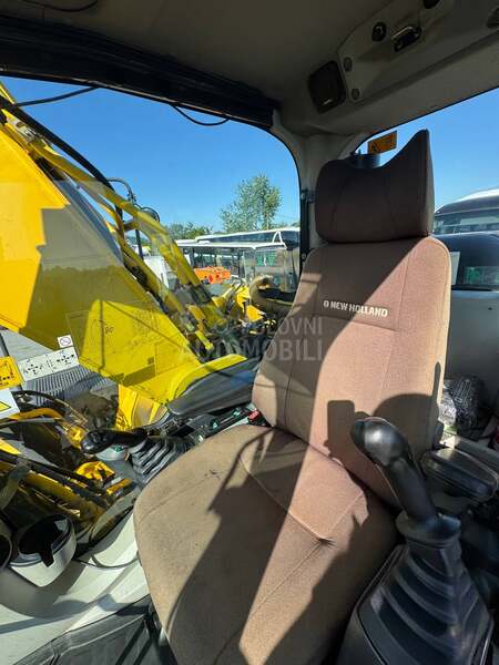 New Holland E 305 C