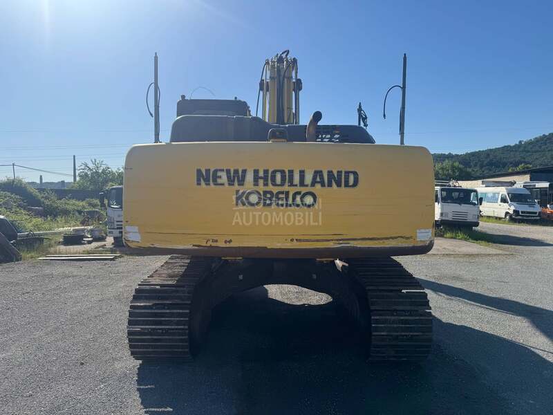 New Holland E 305 C