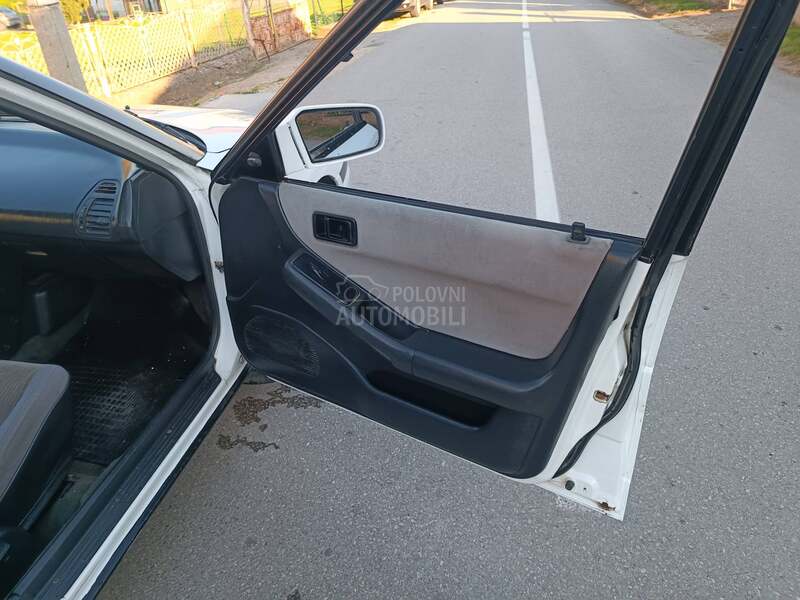 Mazda 323 f 1.8 i