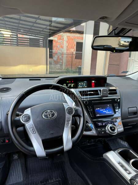 Toyota Prius + HIBRID REG