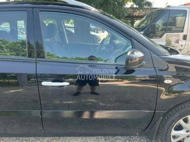 Vrata prednja desna crna NV676 za Renault Koleos od 2008. do 2016. god.