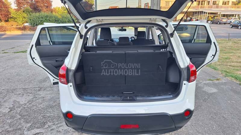 Nissan Qashqai + 2 