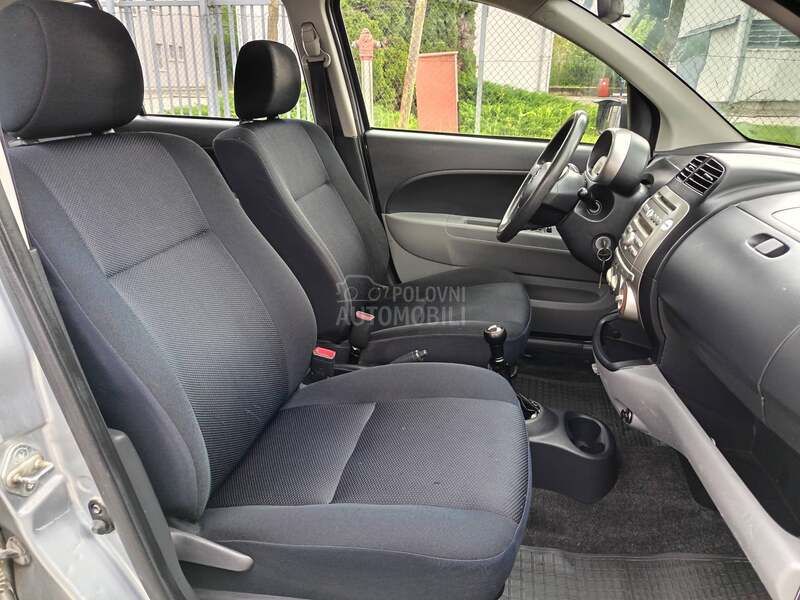 Subaru Justy 1.0B   A C