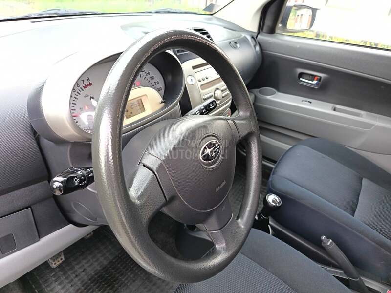 Subaru Justy 1.0B   A C