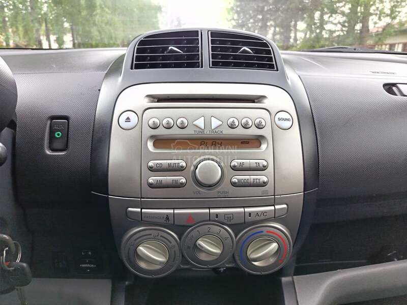 Subaru Justy 1.0B   A C