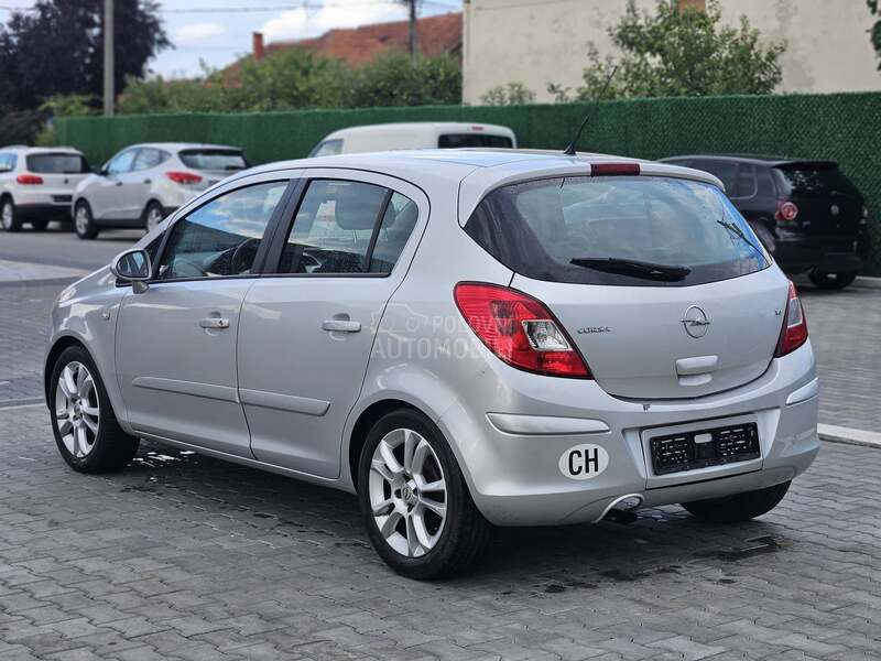 Opel Corsa D 1.4 CH Duple gume