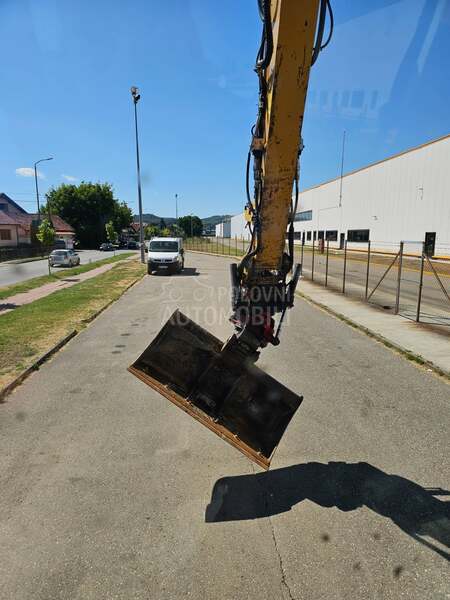 CAT M313D ROTOTILT