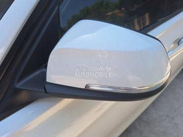 Retrovizor levi beli F30/31 za BMW 315, 316, 318 ... od 2011. do 2018. god.