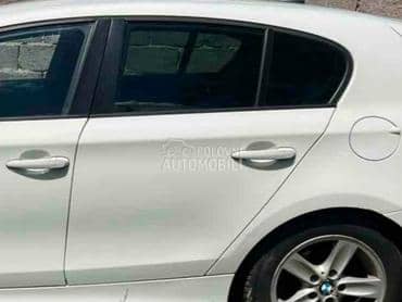 Vrata zadnja leva bela E87 za BMW 125, 116, 118 ... od 2004. do 2013. god.