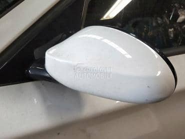 Retrovizor levi beli E87/81 za BMW 125, 116, 118 ... od 2004. do 2013. god.