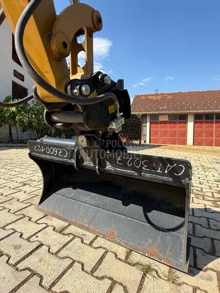 CAT 302.7