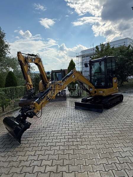CAT 302.7