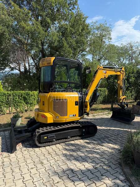 CAT 302.7