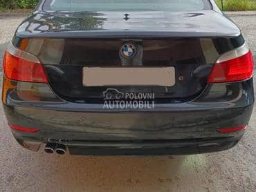 Branik zadnji crni E60 za BMW 520, 523, 524 ... od 2003. do 2010. god.
