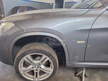 Krilo levo sivo E84 za BMW X1 od 2009. do 2015. god.